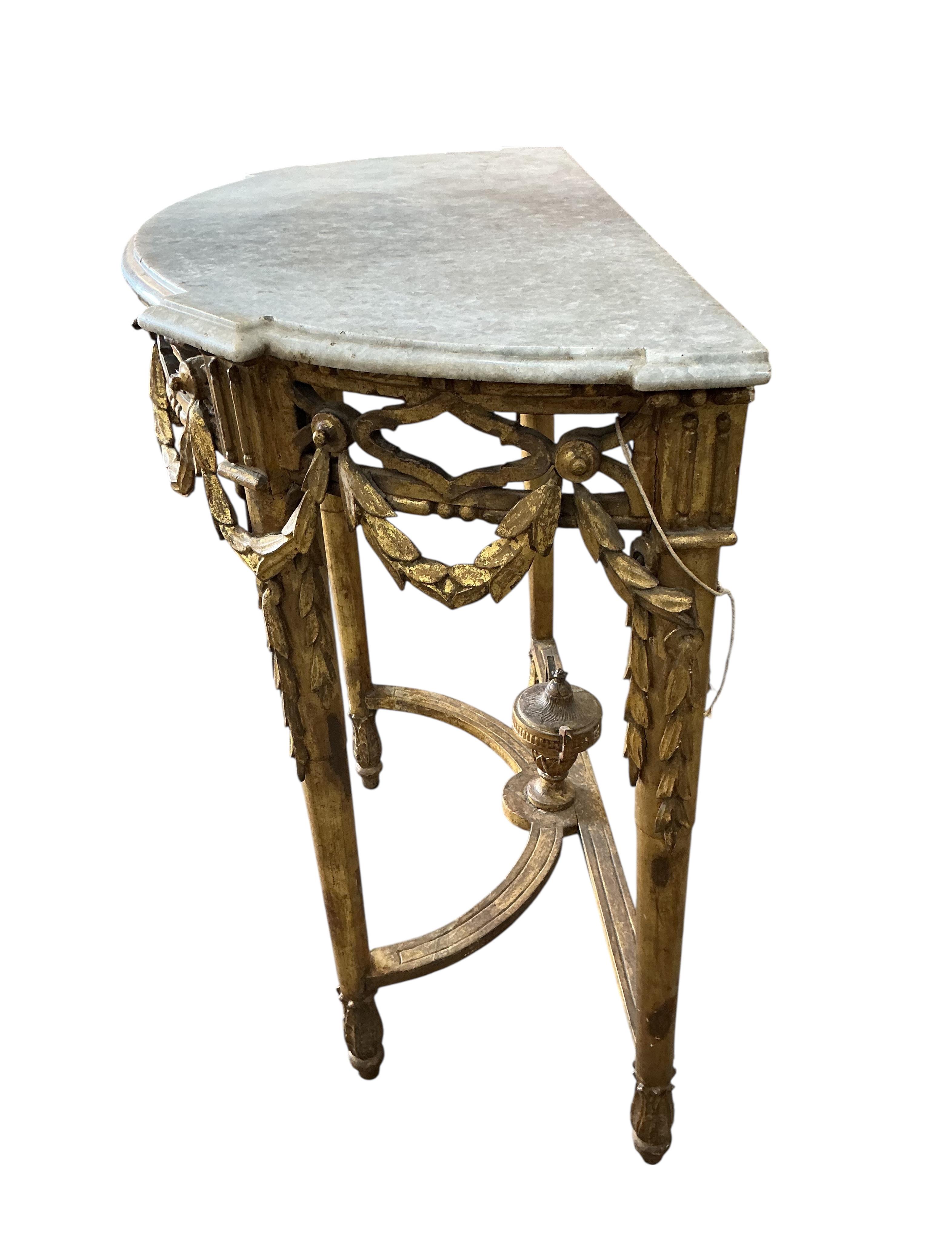 A 19th century Louis XVI style giltwood demi lune table with white marble top, width 82cm, depth 42cm, height 84cm